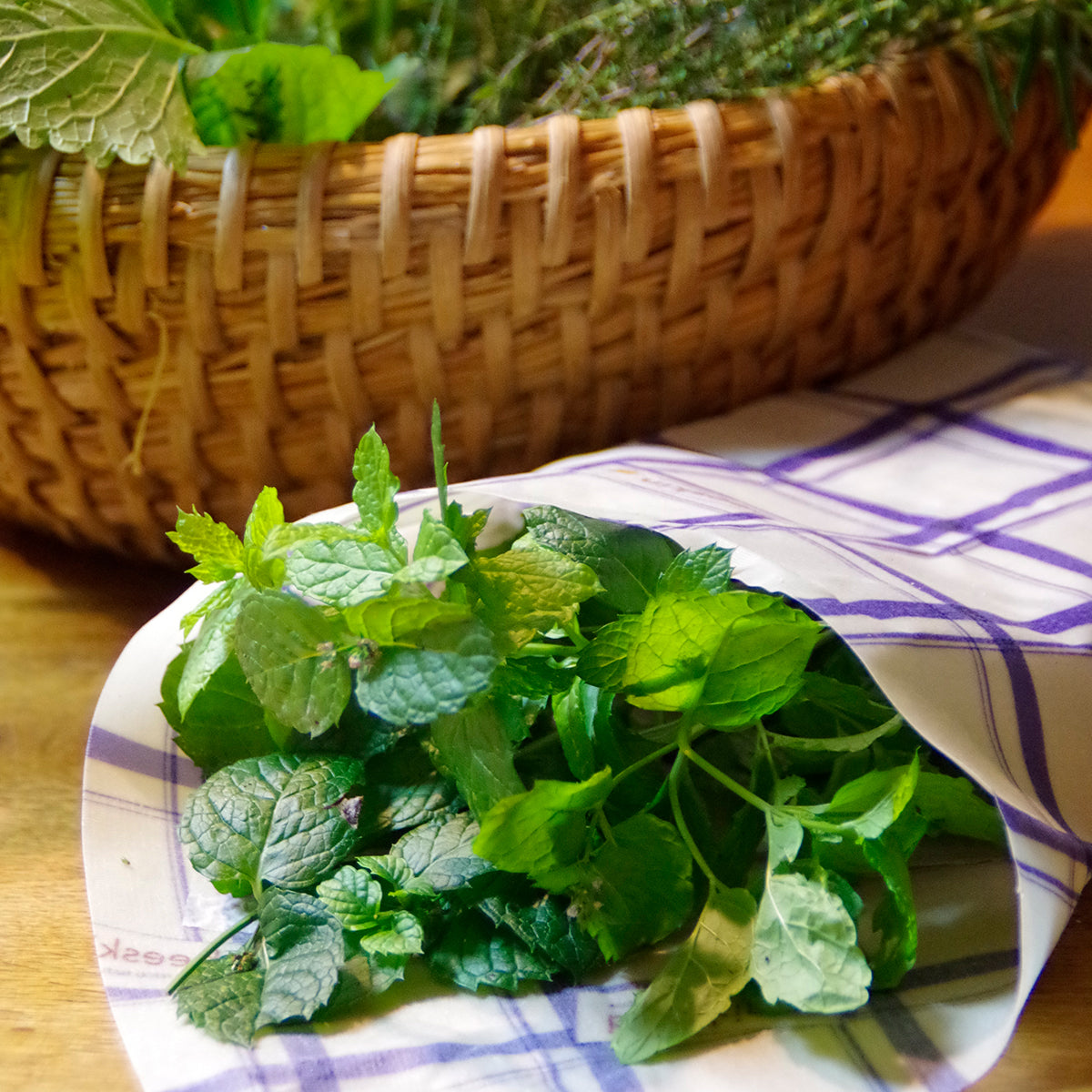 herbs wrapped in beeswax wrap kitchen and a basket with herbs standing on a table