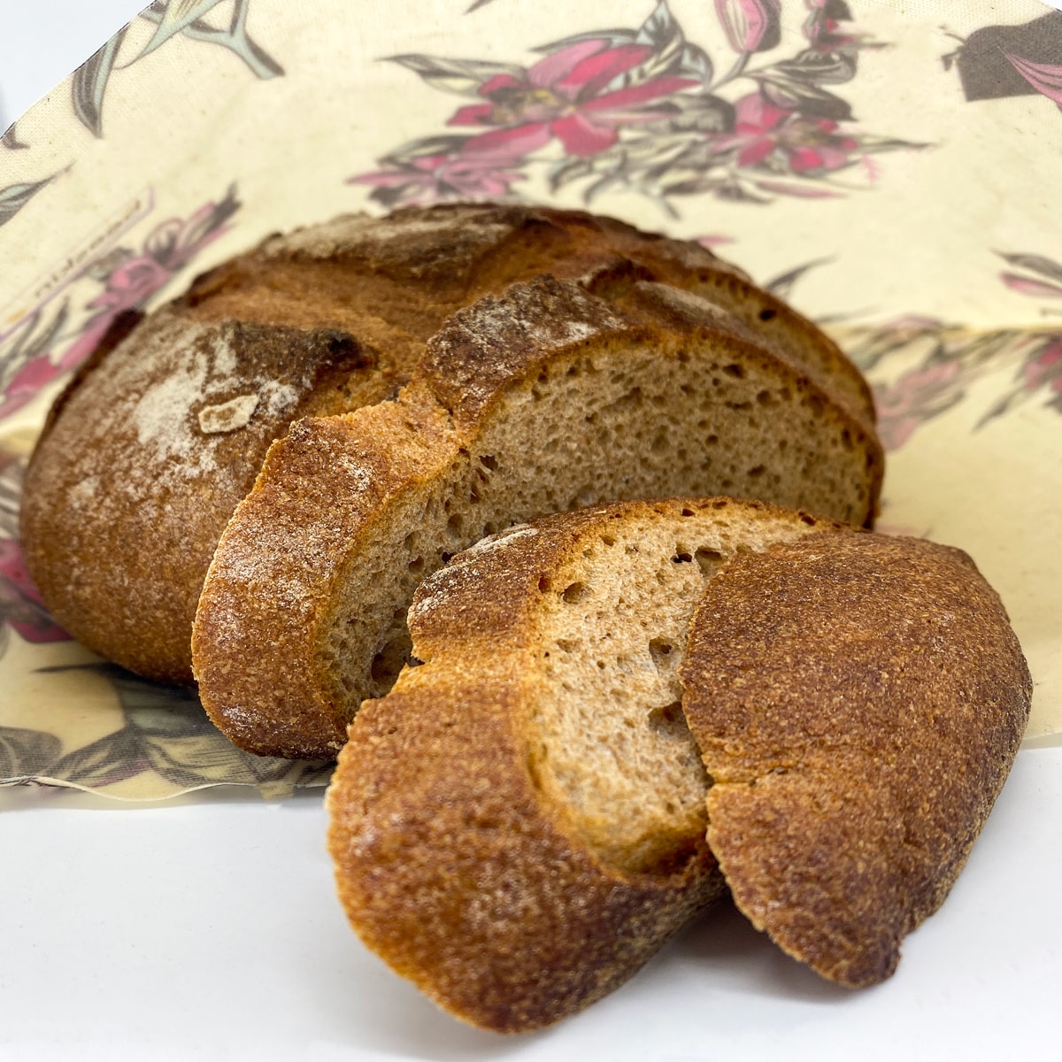 fresh bread cut into slices stored in beeskin beeswax bag size l Victorian design