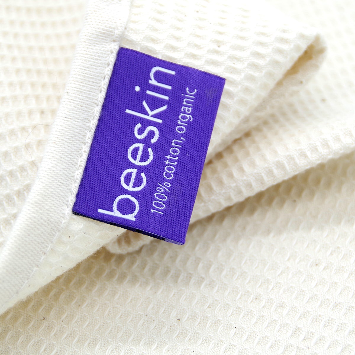 purple beeskin logo, 100% organic cotton