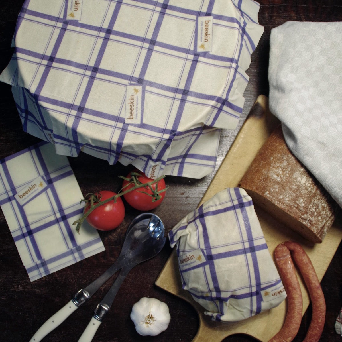 beeskin beeswax wrap multi kitchen covering a bowl and wrapping a loaf of bread