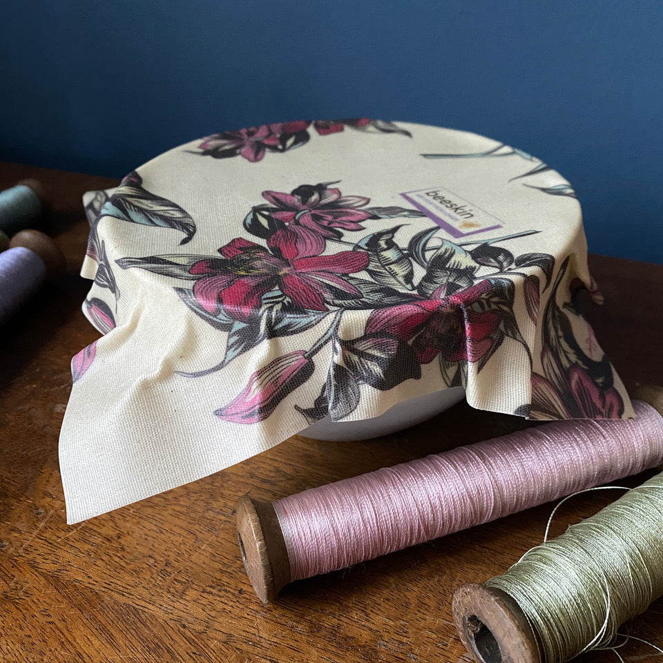 white bowl covered with beeswax wrap size victorian on a wooden table