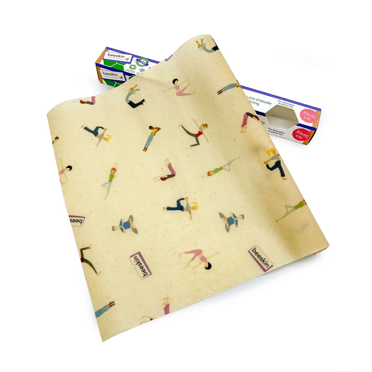 beeskin beeswax roll Yoga next to packaging