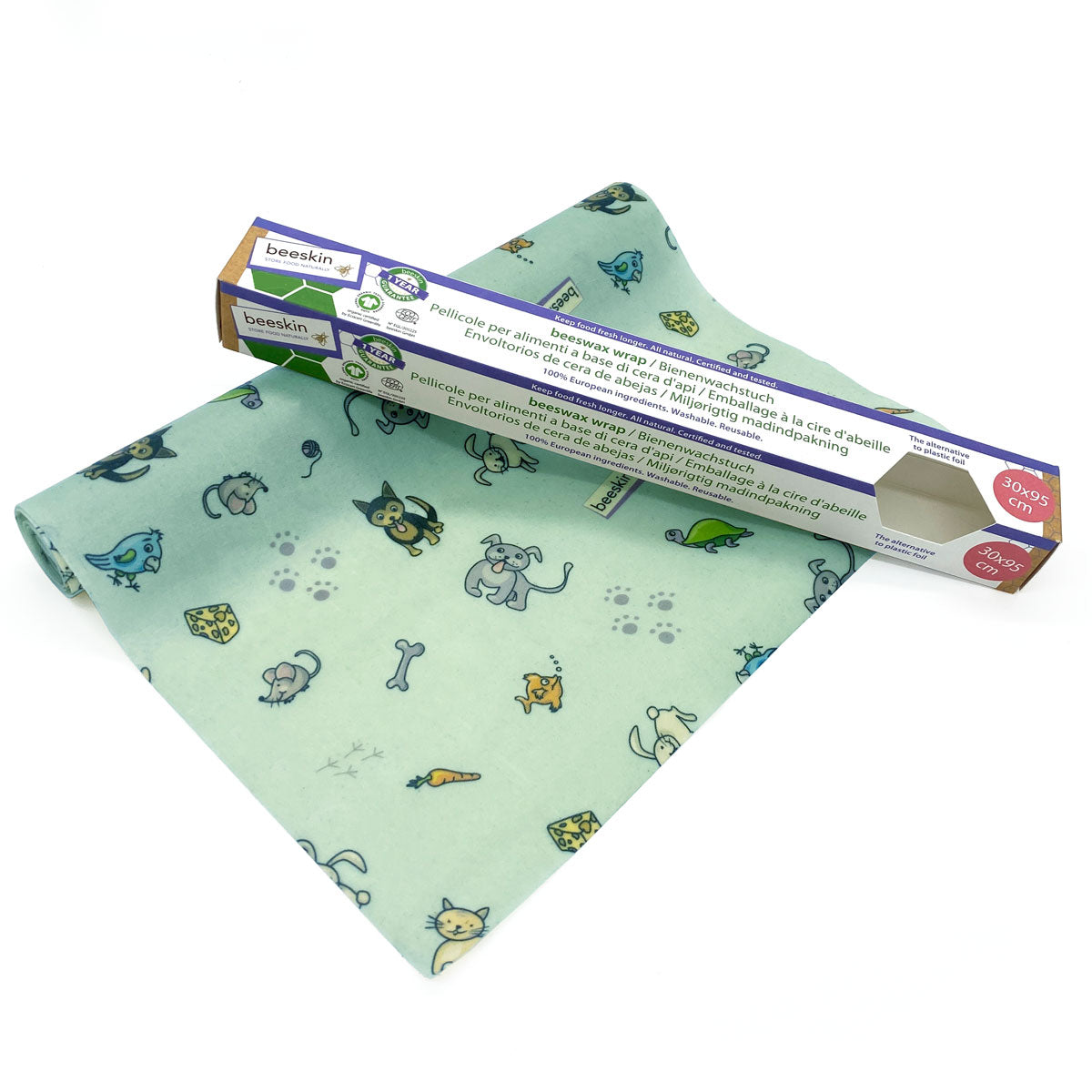 beeskin beeswax wrap roll pets colored next to packaging