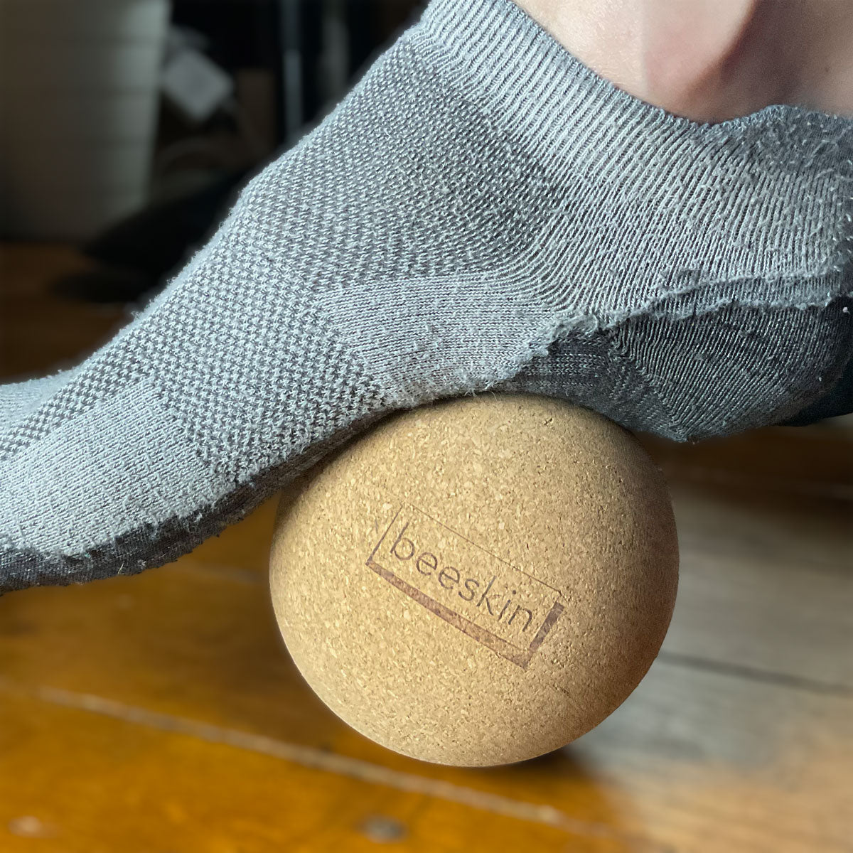 foot rolling over beeskin fascia ball