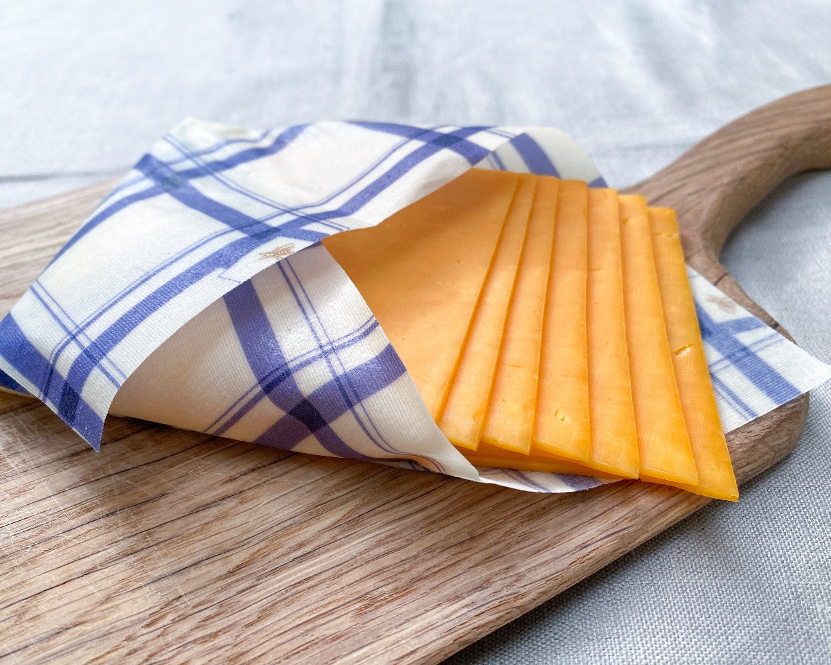 slices of cheese wrapped beeskin beeswax wrap kitchen towel