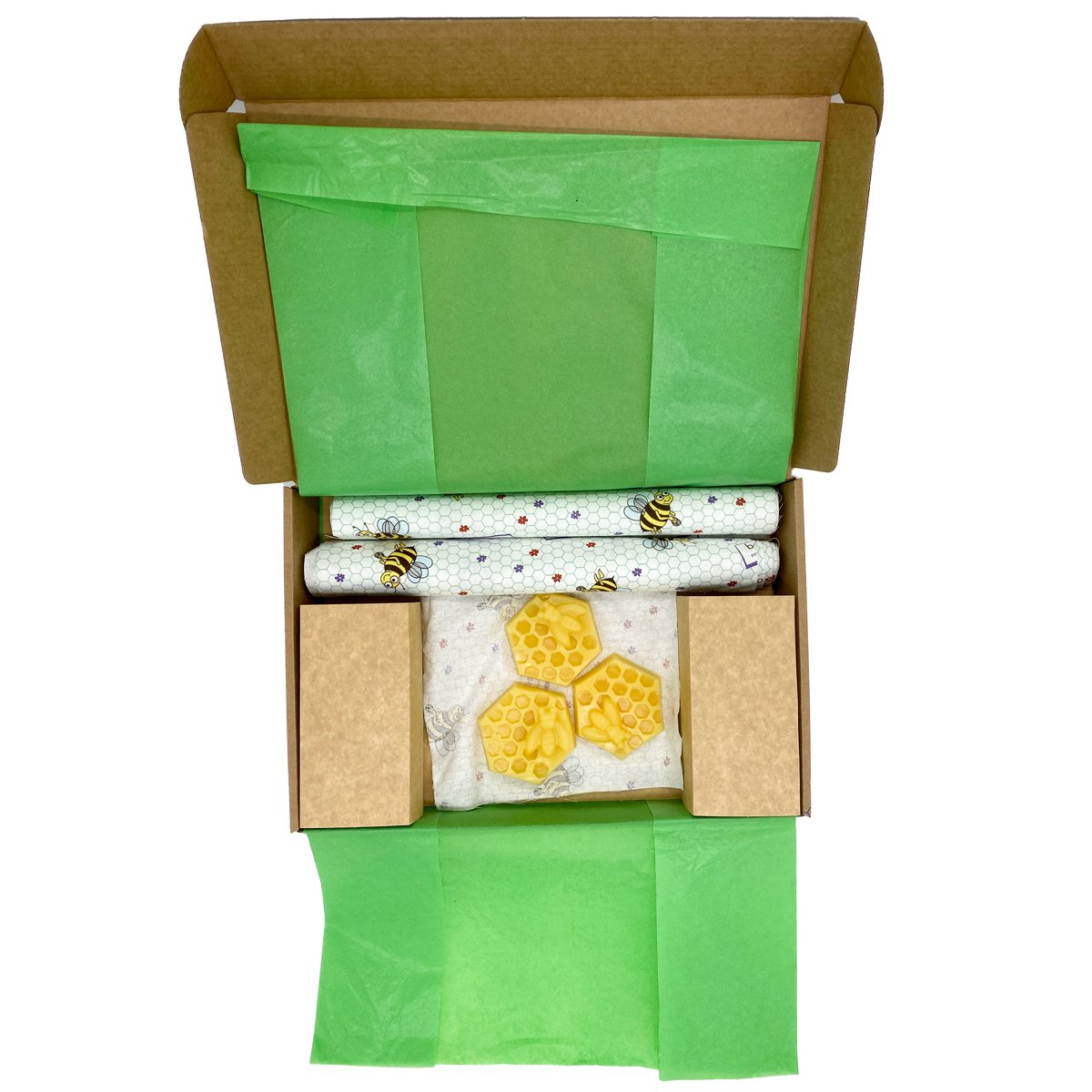 beeskin DIY kit for beeswax wraps from above in the carton including fabric and repair sets