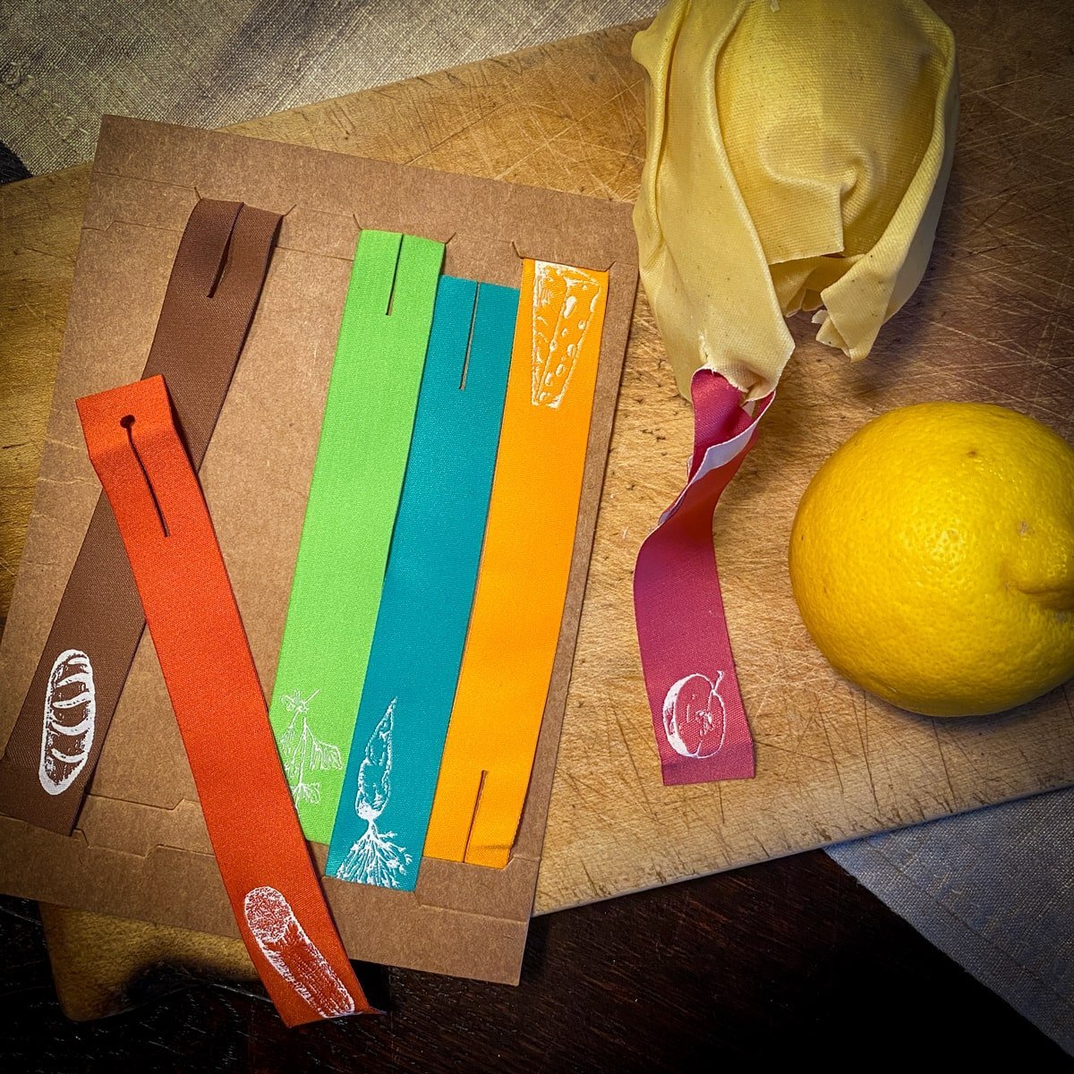 beeskin labels to mark a lemon cut in 2 pieces