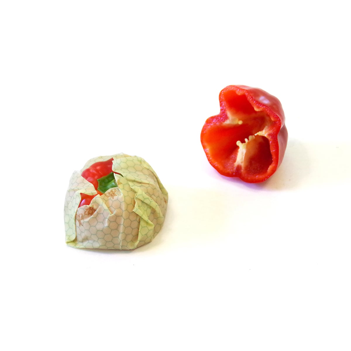 red pepper cut into two halves. once side wrapped in beeskin s
