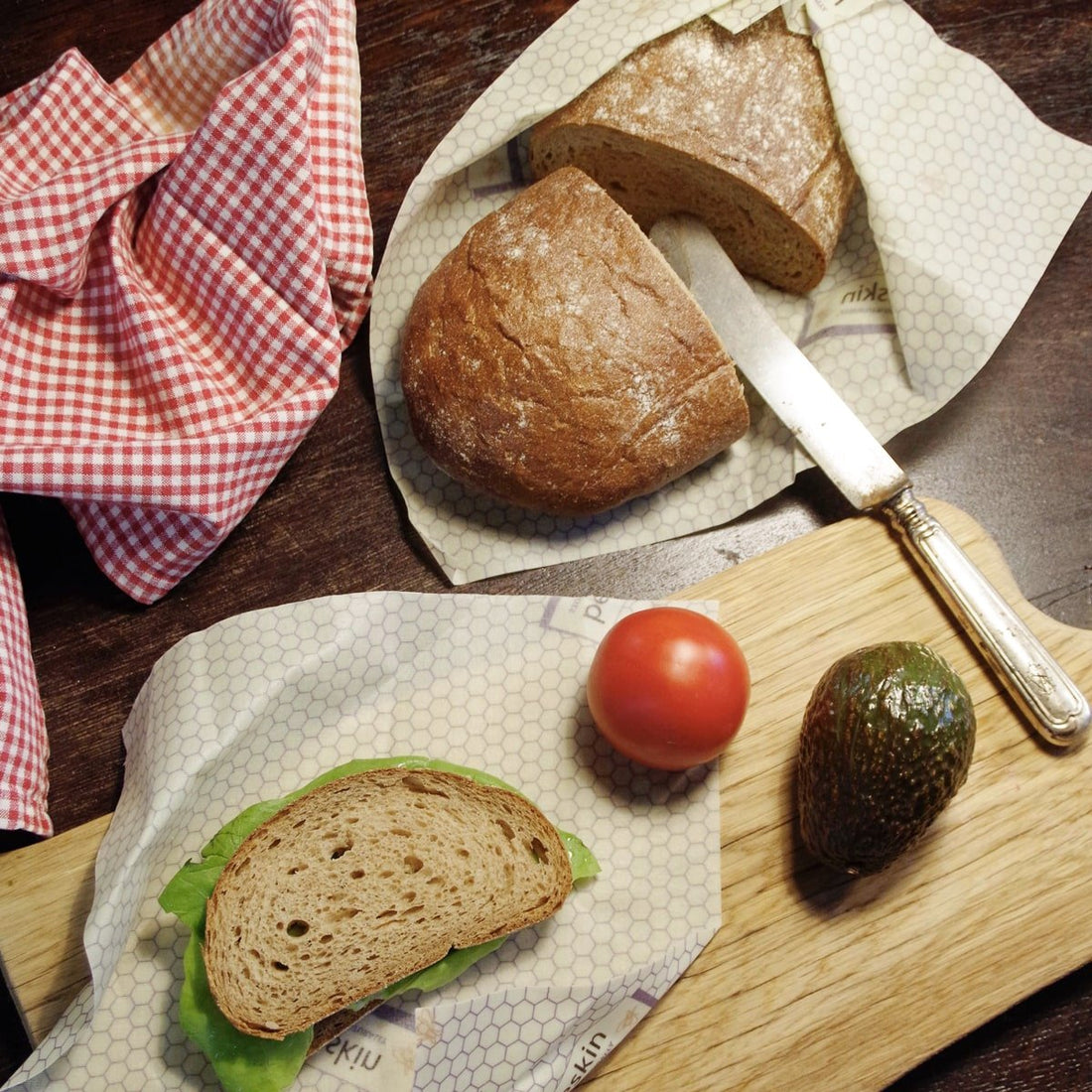 beeskin beeswax wrap ml honeycomb with loaf of bread, tomato and avocado