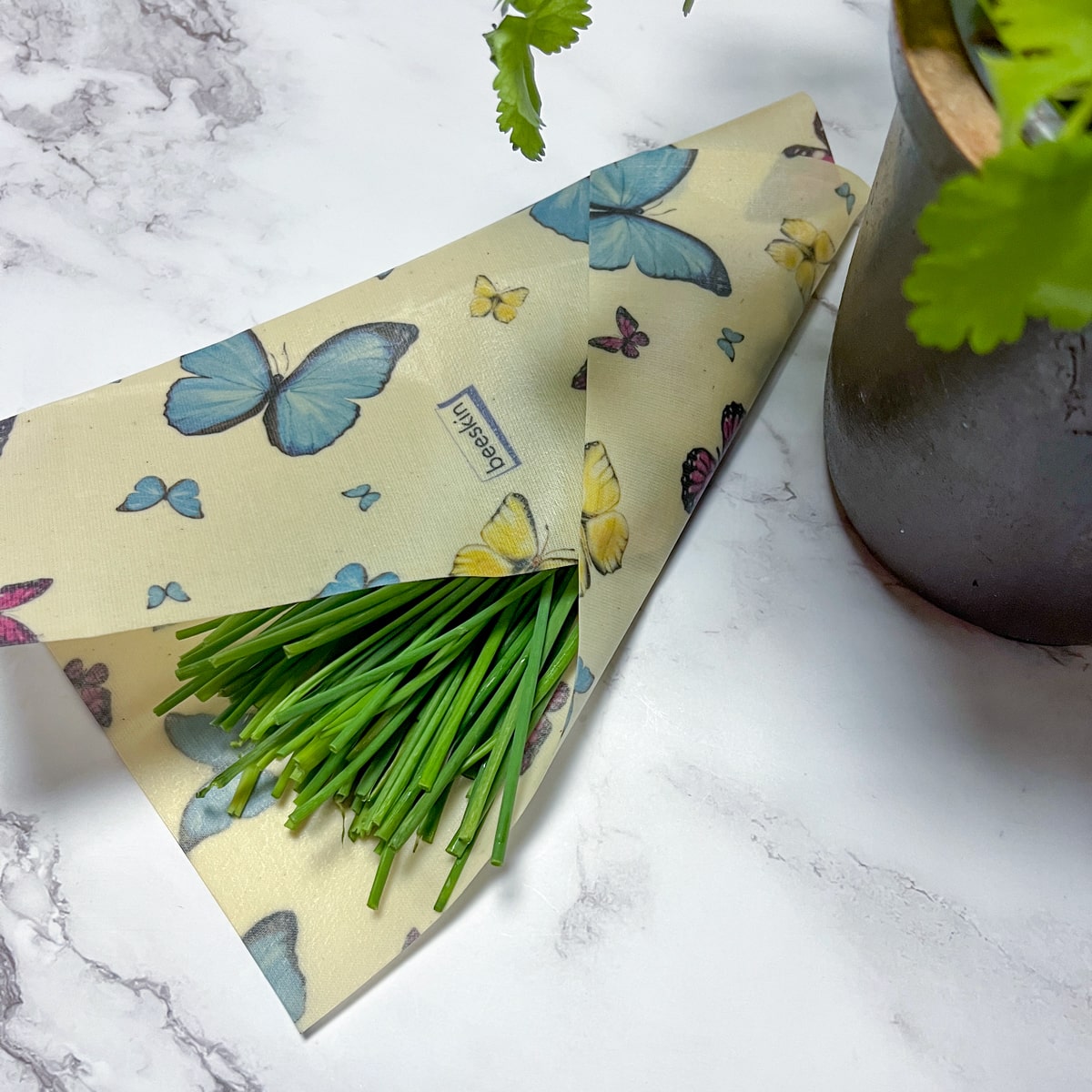 chives wrapped with beeskin beeswax wraps butterflies design