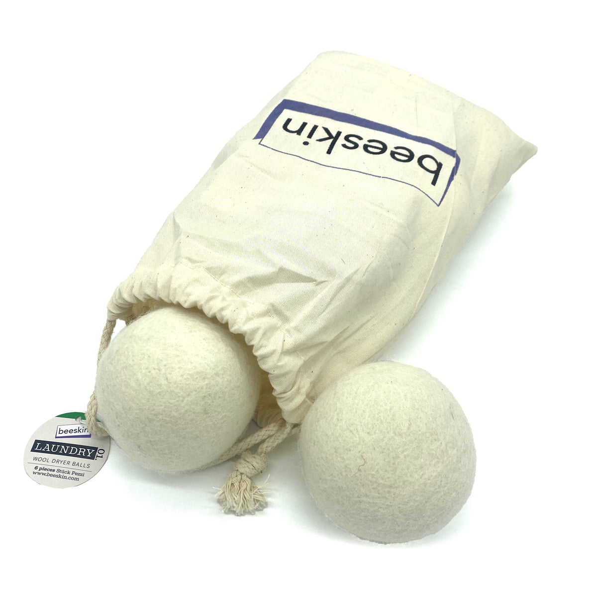 beeskin six dryer balls in a fabric sack with beeskin logo