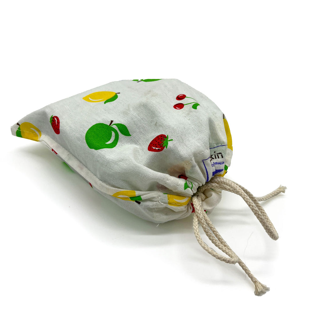 fabric bag fruit design closed with a twine