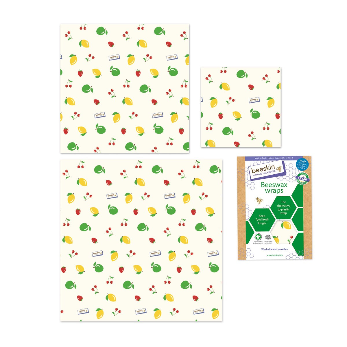 beeskin beeswax wrap multi fruit next to packaging