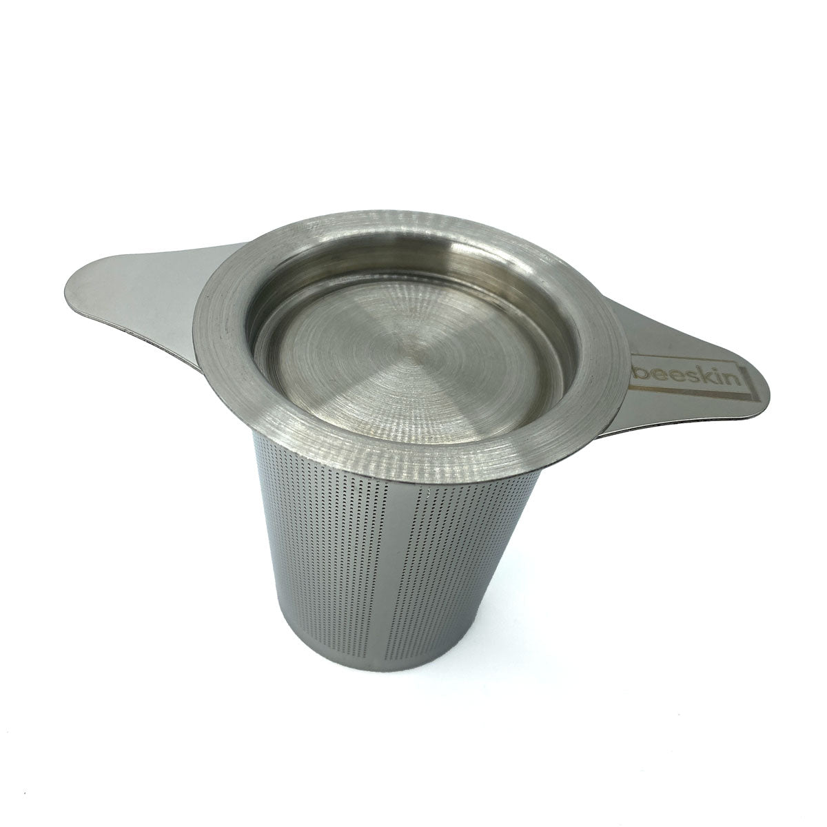 tea infuser from above with beeskin logo and cap