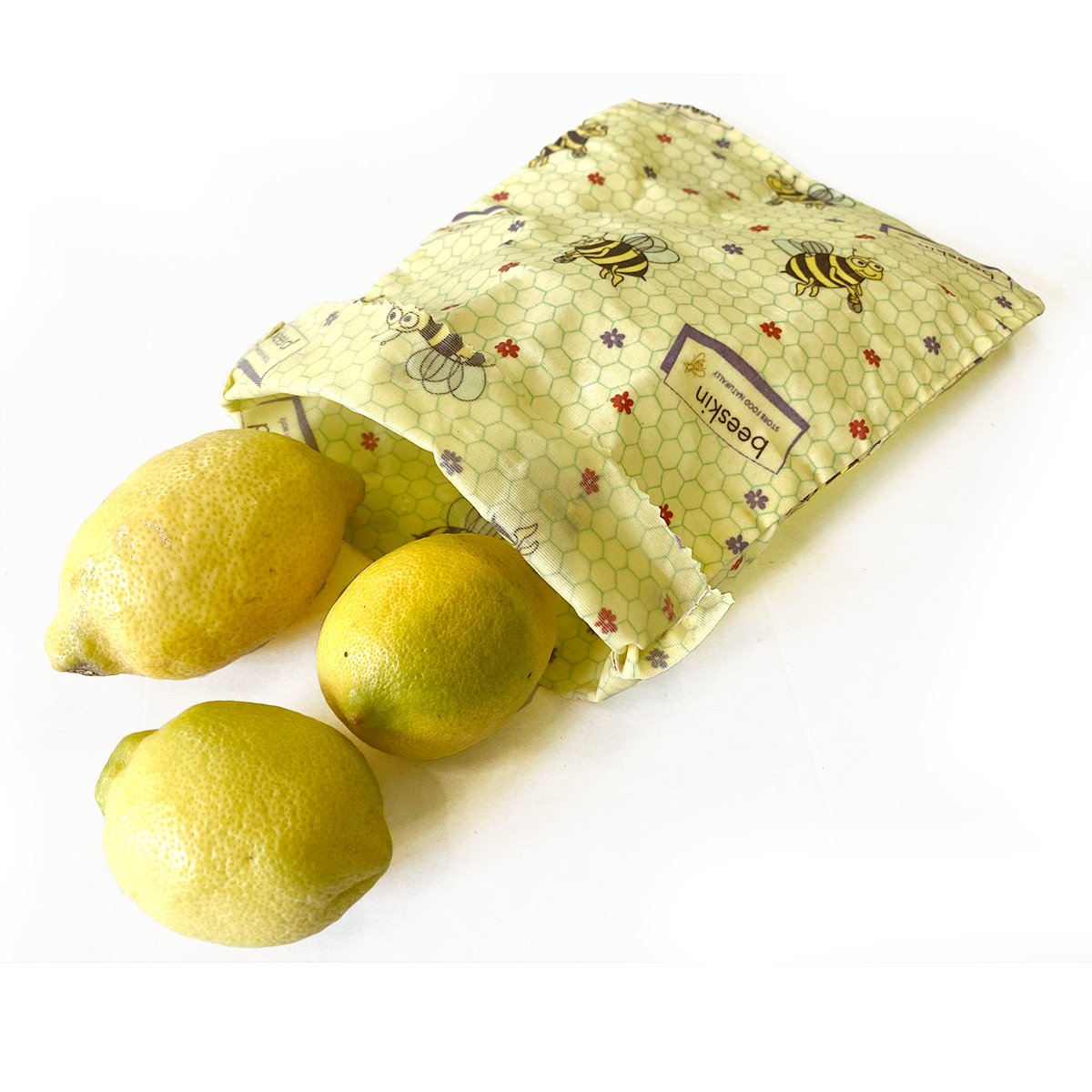 beeskin beeswax bag size s in kids design. shown with lemons