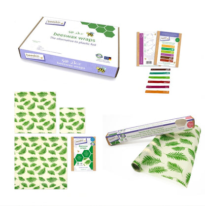overview beeskin giftbox palm leaves showing multi, roll and labels next to packaging
