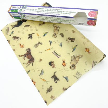 beeswax roll with dogs and other pets  next to package