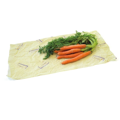 bunch of carrots laid down on a beeskin size xl