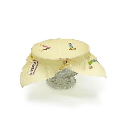 beeswax wrap Yoga covering a glass bowl